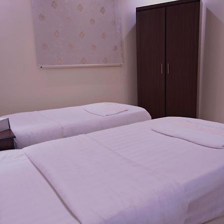ホテルHolool Furnished Units マディーナ エクステリア 写真
