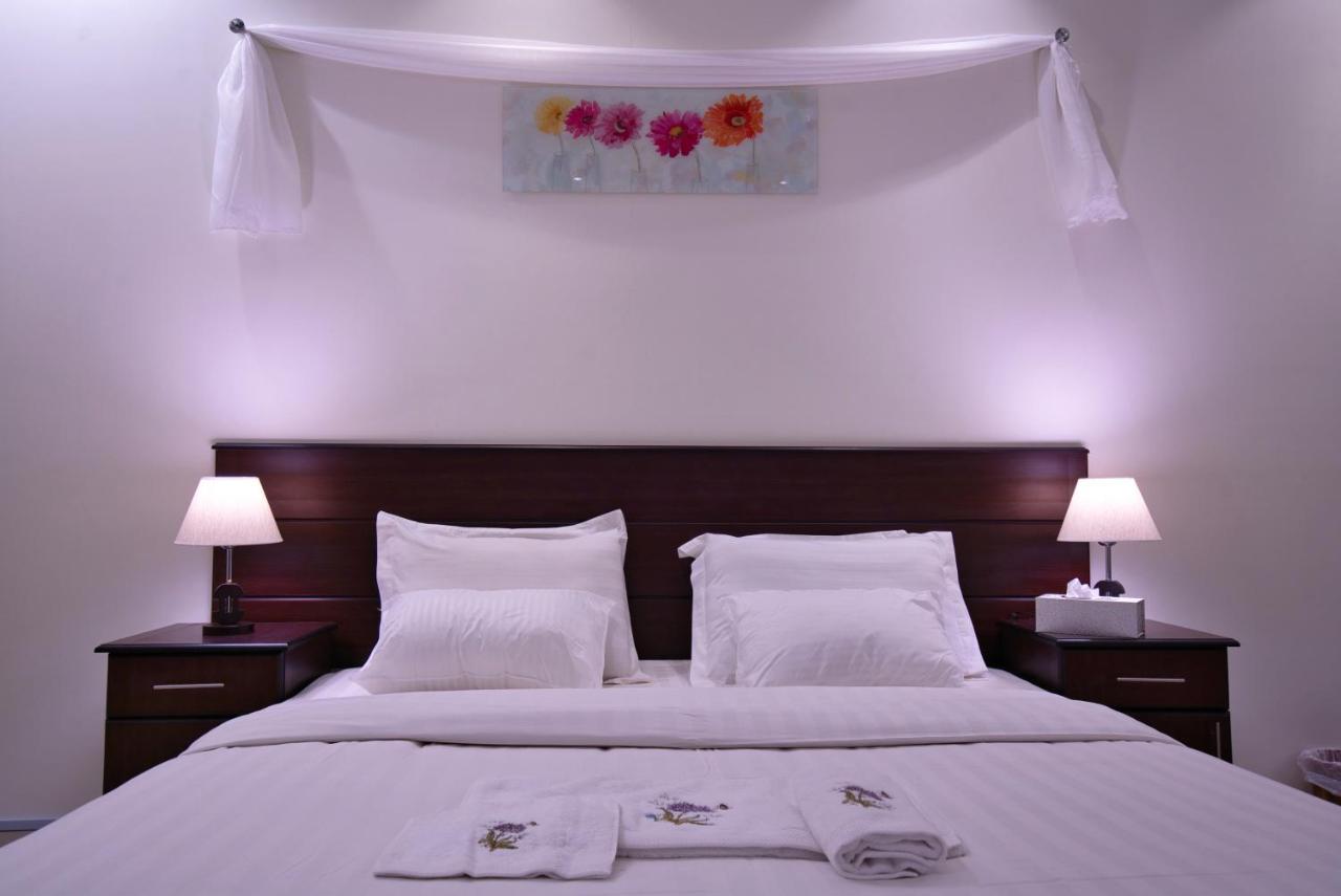 ホテルHolool Furnished Units マディーナ エクステリア 写真